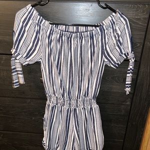 Stylish blue & white striped romper by Derek Heart. Size: Small